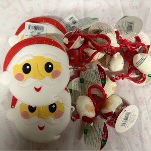Michaels creatology squishy Santa Claus coin purses and clips. . New with tags.